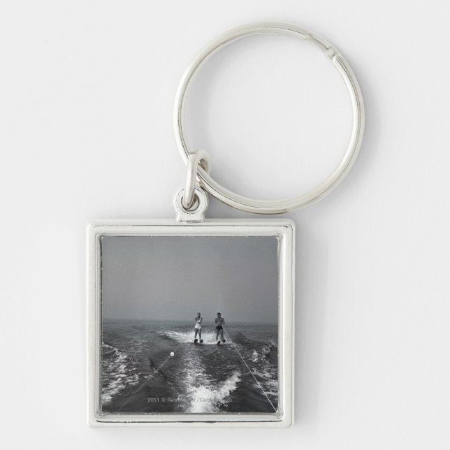 Two people waterskiing key ring (Front)