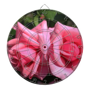 two perfect hot pink rose flowers. love dartboard