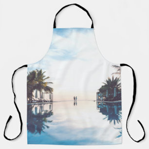 Two person standing beside swimming pool apron