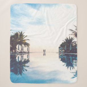 Two person standing beside swimming pool sherpa blanket