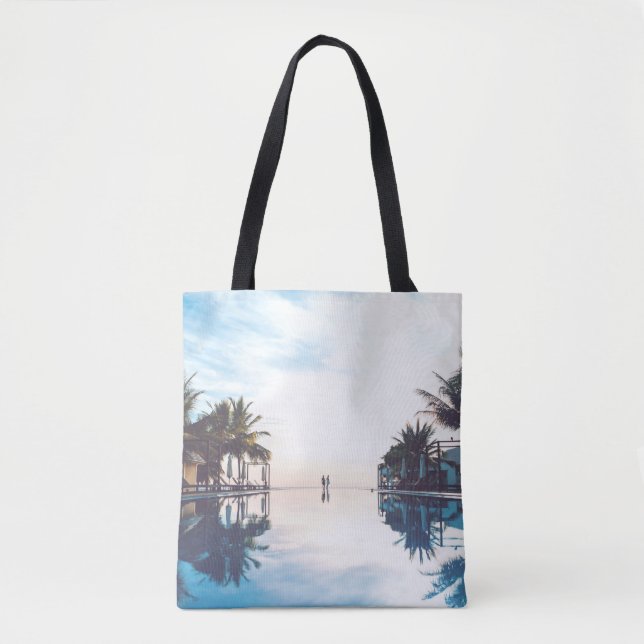 Two person standing beside swimming pool tote bag (Front)