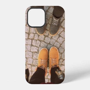 Two person standing in front each other photo iPhone 12 case