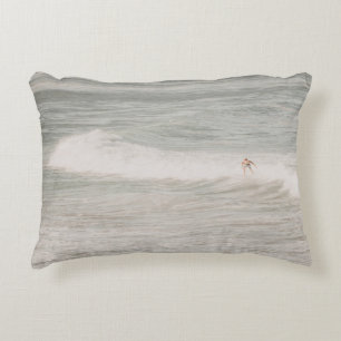 TWO PERSON SURFING ON SEA WAVES DURING DAYTIME DECORATIVE CUSHION