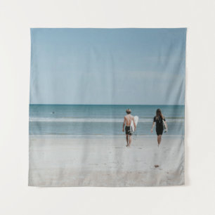 Two person walking on coast tapestry
