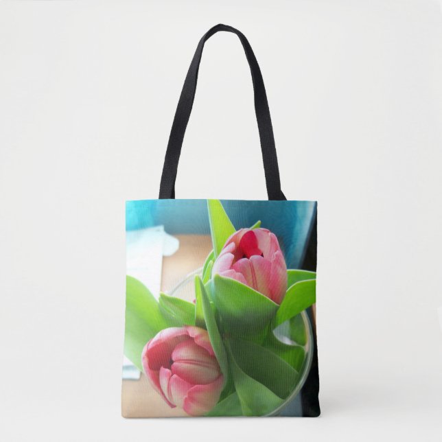 two pink tulips on an all-over printed tote bag (Front)