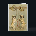 Two pug dogs ringing the Christmas bells Holiday Card<br><div class="desc">This design is based on the two cute little pug dogs ringing the Christmas bells.This is  very cute.It makes a great conversational piece and is a great gift for any occasion.I do offer customisation,  so please message me with any questions or request.</div>
