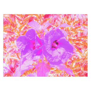 Two Purple and Hot Pink Plum Crazy Hibiscus on Red Tablecloth