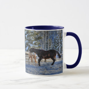 Two Ranch Horses Playfighting in Snow in Winter Mug