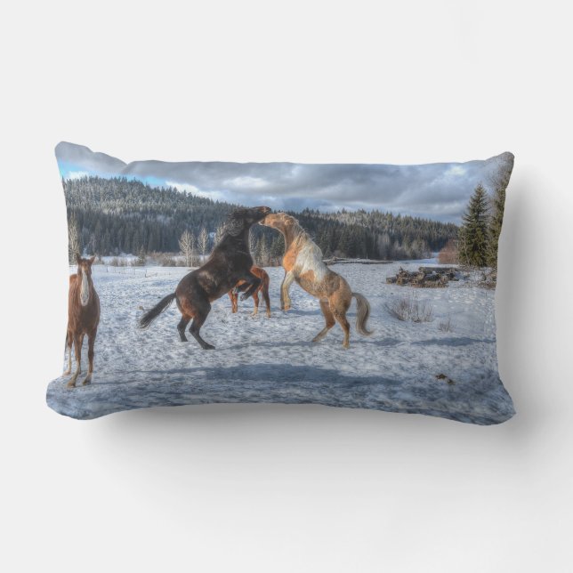 Two Ranch Horses Playfighting in Winter Snow Lumbar Cushion (Front)