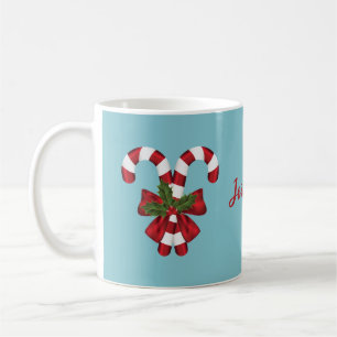 Two Red And White Candy Canes On Blue With Name Coffee Mug