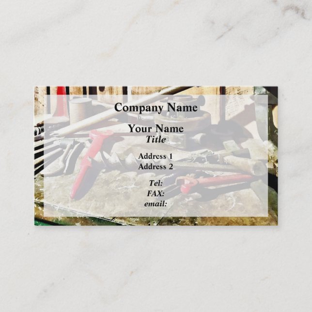 Two Red Wrenches on Plumber's Workbench Business Card (Front)
