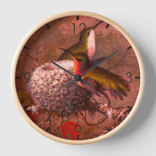 TWO RUBY THROATS BY THEIR NEST CLOCK
