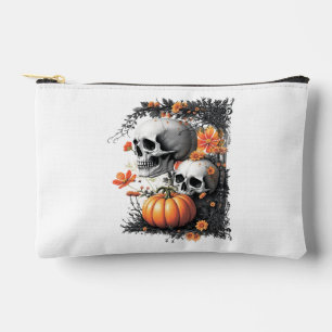 Two skulls and a pumpkin among flowers. accessory pouch