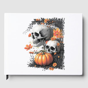 Two skulls and a pumpkin among flowers. guest book