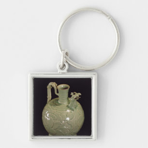 Two spouted jug with a leaf design key ring