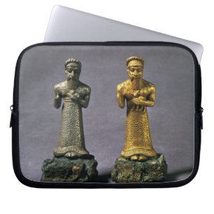 Two statuettes of men carrying offerings of goats, laptop sleeve