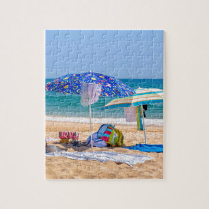 Two sun umbrellas and beach supplies at sea.JPG Jigsaw Puzzle