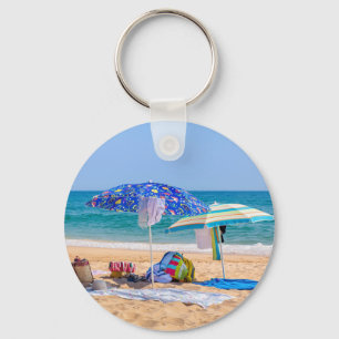 Two sun umbrellas and beach supplies at sea.JPG Key Ring