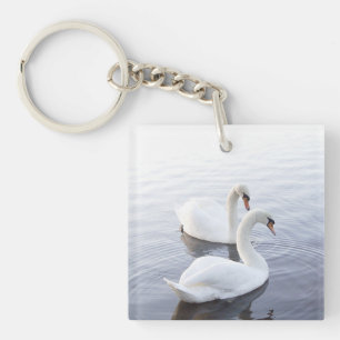 Two Swans Swimming on Tranquil Lake Key Ring
