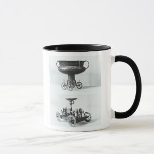 Two votive chariots for collecting rainwater mug