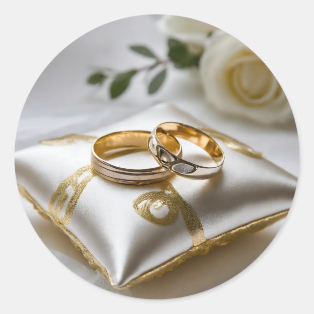 Two wedding rings on a white pillow  classic round sticker (Front)