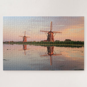Two windmills with reflection at sunset jigsaw puzzle