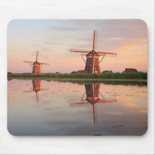 Two windmills with reflection at sunset mouse pad