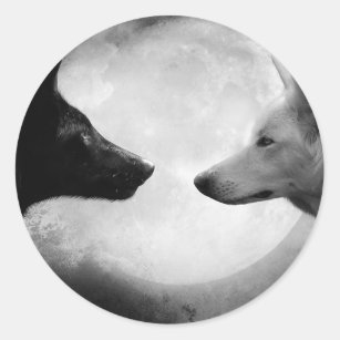 Two wolves facing each other classic round sticker