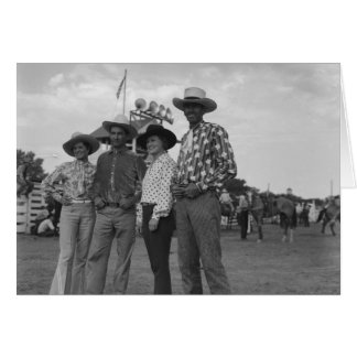 Two women and two men at a rodeo.