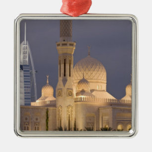 UAE, Dubai. Mosque in evening with Burj al Arab Metal Tree Decoration