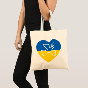 Ukraine flag, blue and yellow heart peace dove tote bag
