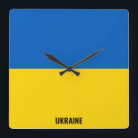 Ukraine Flag Dazzling Patriotic Square Wall Clock<br><div class="desc">Ukraine Flag Dazzling Patriotic Square Wall Clock in the colours and the elements of the Ukraine national flag covering the front of the clock. National flag colours are complemented with the text "Ukraine" on the bottom. Text is fully customisable using "Customise it!" feature. Feel free to change it, remove it...</div>