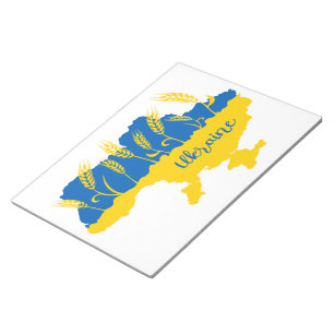 Ukraine typography and wheat ear on Ukrainian flag Notepad