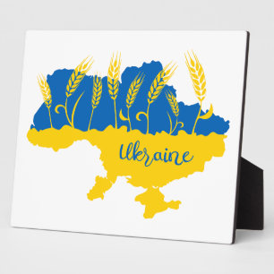 Ukraine typography and wheat ear on Ukrainian flag Plaque