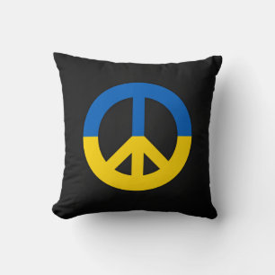 Ukrainian peace sign on a black background cushion