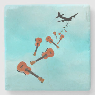 Ukuleles dropping from and aeroplane stone coaster