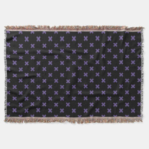 Ultra violet cross stitches on black throw blanket