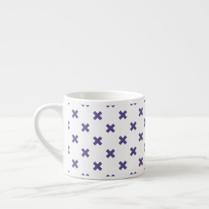 Ultra violet cross stitches on white espresso cup