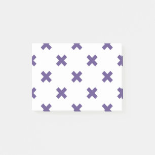 Ultra violet cross stitches on white post-it notes