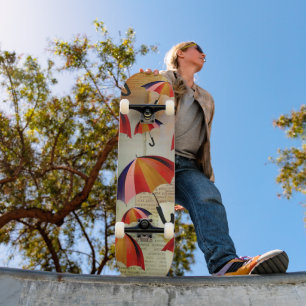 UMBRELLA PATTERNS IN A CAPTIVATING COLLAGE SKATEBOARD