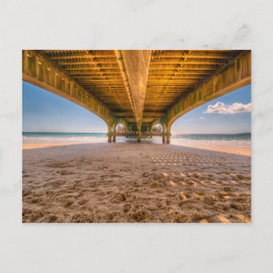 Under a Pier, Beach with Footprints, Ocean, Sky Postcard
