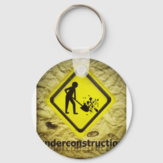 under construction sign key ring