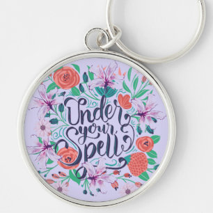 UNDER YOUR SPELL KEY RING