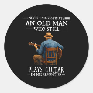 Underestimate an old man who plays guitar seventie classic round sticker