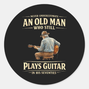 Underestimate an old man who plays guitar seventie classic round sticker