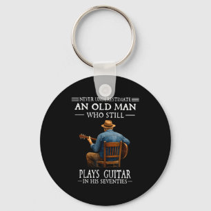 Underestimate an old man who plays guitar seventie key ring