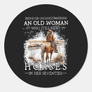 Underestimate an old woman who rides horses classic round sticker