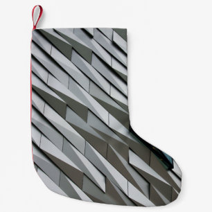 Undulating abstract shapes on a building facade at small christmas stocking