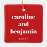 Unique Custom Place Card Christmas Wedding Red Ceramic Ornament<br><div class="desc">Make your winter wedding extra special with this unique custom ceramic ornament in red and white, doubling as a personalised place card for your guests. Featuring their name in elegant typography, it serves as a thoughtful escort card and a keepsake they can treasure. Perfect for a Christmas wedding, this festive...</div>