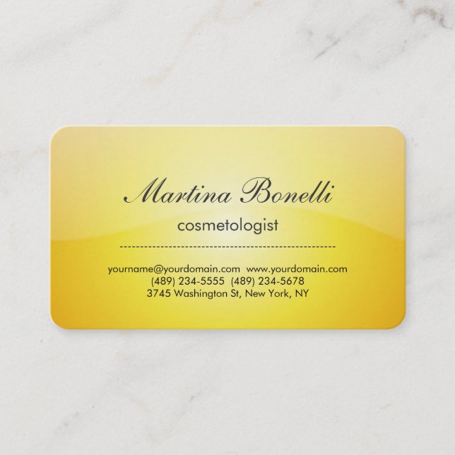Unique yellow cosmetologist business card (Front)
